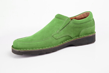 Male green leather shoe on white background, isolated product.