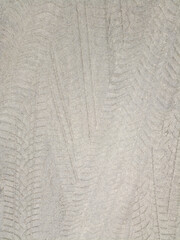 Tire  pattern on sand texture background