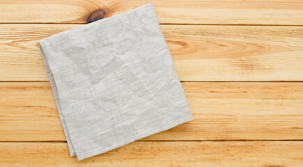 Empty canvas napkin top view on wooden desk