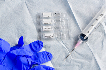 liquid morphine sulphate glass vial and syringe