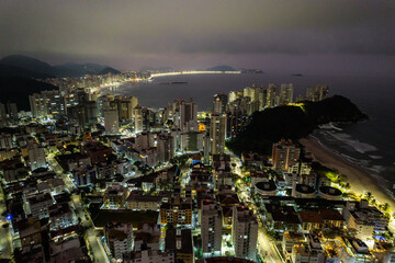 Guarujá city at night. View of Praia do Tombo and Praia das Asturias. Beaches on the coast of...