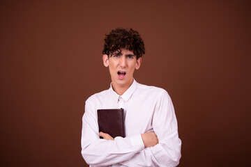 Young attractive guy with a book.