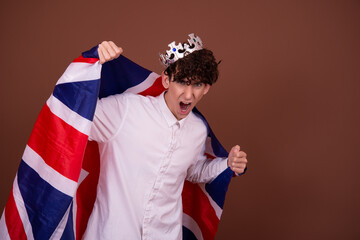 Funny man in a silver crown.	