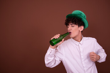 Funny guy with a green bottle	