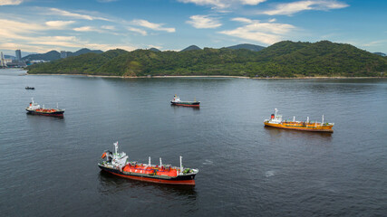 Fototapeta na wymiar Aerial view oil and gas petrochemical tanker, Refinery industry cargo ship, Fuel global business transportation, Oil product tanker and LPG tanker at sea.