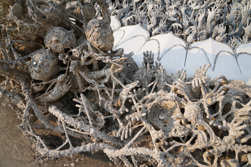 Wat Rong Khun is a white Buddhist temple located near the city of Chiang Rai in Thailand