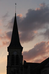 Silhouette of a French church steeple at sunset (Église Saint Philippe Saint Jacques, Chatillon,...