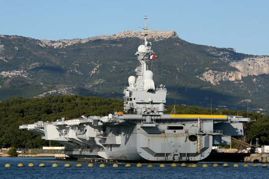 R91 Charles de Gaulle is an aircraft carrier of the French Navy seen here docked in the naval port at Toulon, France
