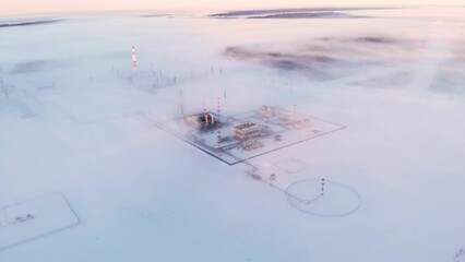 Oil and gas field in siberia in winter. Oil production in arctic conditions at extremely low...