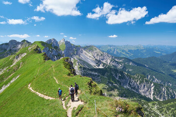 Hiking near a cliff in the mountains around lake Achensee, Austria