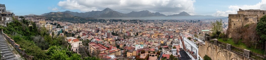 Fototapeta na wymiar Panoramic view of Napoli's city center, mountains in the background