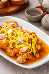 crispy chicken with mango sauce or Ayam Saus Mangga. The taste is savory spicy and a little sweet.