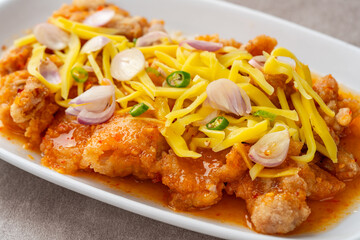 crispy chicken with mango sauce or Ayam Saus Mangga. The taste is savory spicy and a little sweet.
