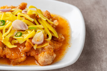 crispy chicken with mango sauce or Ayam Saus Mangga. The taste is savory spicy and a little sweet.