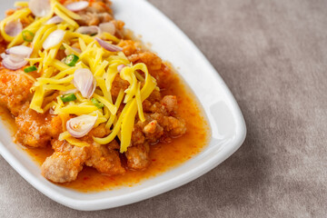 crispy chicken with mango sauce or Ayam Saus Mangga. The taste is savory spicy and a little sweet.
