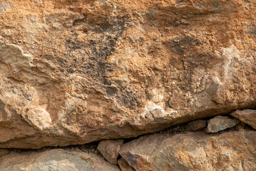 Detailed texture close up photo of rough and big mountain stones