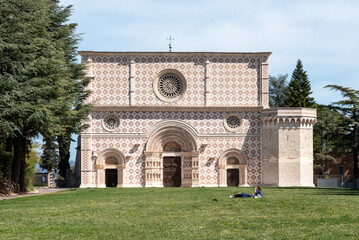 Beautiful Romanesque portal of the basilica Santa Maria di Collemaggio in L'Aquila, Italy - obrazy, fototapety, plakaty