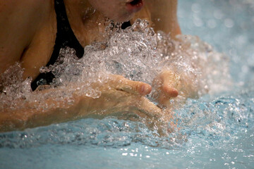 Woman Swims the Breaststroke