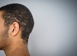 Obraz premium afro american man ear detail