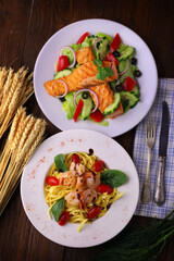 delicious seafood and salmon and lettuce dishes - 520229733