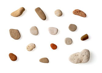 Fototapeta na wymiar Multicolored sea pebbles set isolated on a white background. Variety of small rounded colorful stones from a beach cutout. Design element for summer travel, holydays, sea vacation concept. Macro.
