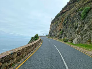Fototapeten Rocky and scenic Chapman's peak drive between Hout bay and Noordhoek in Cape town © shams Faraz Amir