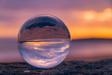 glass sphere on the beach