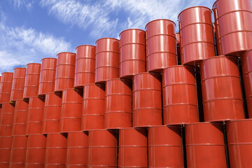Oil barrels or chemical barrels are located at the base.