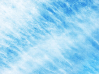 Blue sky with feathery clouds