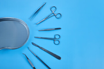 surgical equipment at surgery desk. Medical tools such scissors, scalpel.