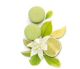Citrus lime and green macarons on a white background.