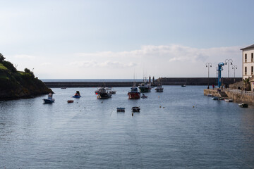 fishing port in the north of spain with the boats sheltered in it