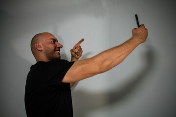 man taking a selfie at home 