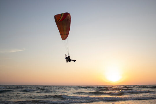 paragliding in the sunset
