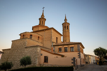 Obraz premium Parish Church of Our Lady of the Assumption at sunset in Fuendetodos, Campo de Belchite, province of Zaragoza, Aragon, Spain
