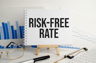risk-free rate words on notepad. Business concept