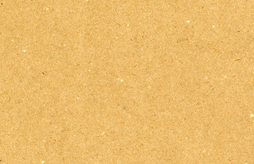 Highly detailed close up brown cardboard recycled uncoated smooth paper texture scan with dust and colorful particles with copyspace for text for high resolution wallpaper or mockup
