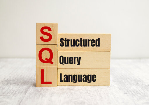 SQL text Structured Query Language on wooden cubes