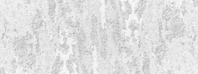 Grainy and scratched white marble or stone wall texture, white or gray paper texture with grainy and scratches spots and stains, white and dark grunge texture as background and wallpaper.