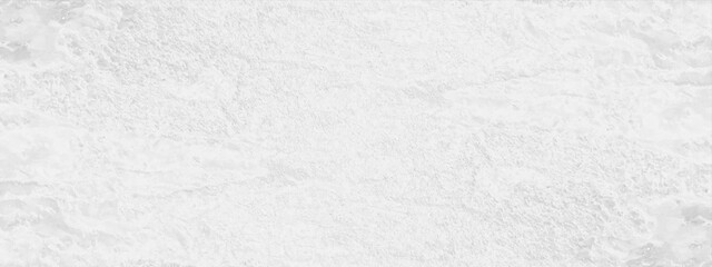 Grainy and scratched white marble or stone wall texture, white or gray paper texture with grainy and scratches spots and stains, white and dark grunge texture as background and wallpaper.