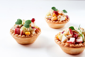 canapes with salad, corn with crab sticks, appetizer, portioned, close-up, no people,