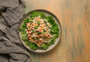 Canned corn salad, with crab sticks, top view, no people,