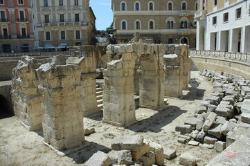 Fototapeta na wymiar Roman amphitheater of the II century partially underground and located in piazza Sant'Oronzo in the center of Lecce