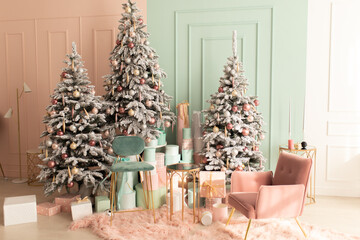 Stylish interior of living room with Christmas tree and lights glowing garlands. Christmas room interior home