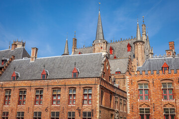 Fototapeta premium Bruges towers, flemish architecture building facades, Belgium