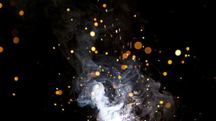 Super Slow Motion of Flying Fire Sparkles. Detail shot, Low Depth of Focus.