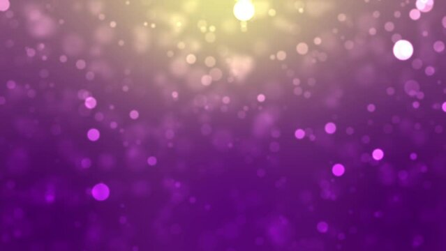 Festive animated purple background with yellow light and sparkling bokeh particles.