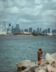 woman on the beach phone views miami usa 