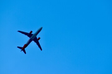 Bottom view of an aeroplane in the sky