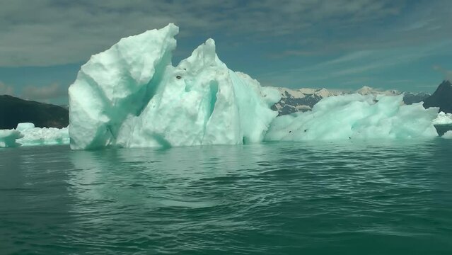 Large Iceberg in Alaska water, sailing shot
North America nature and global warming concept, Alaska, 2022
